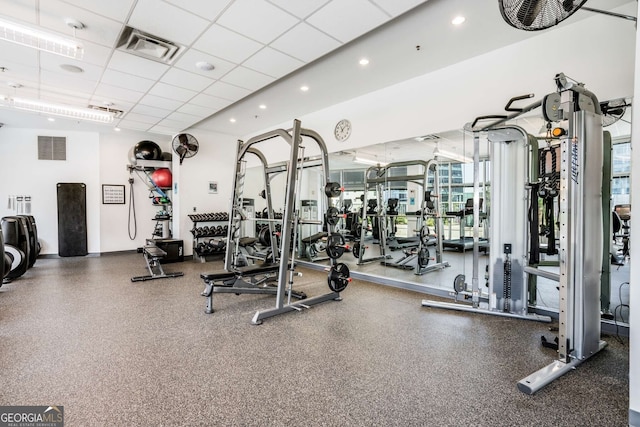 gym with a drop ceiling