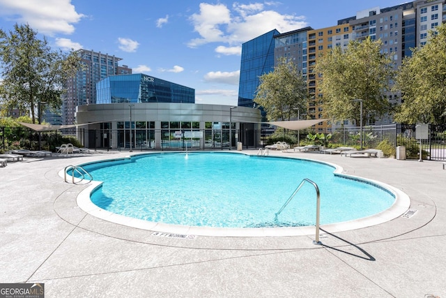 view of pool with a patio area