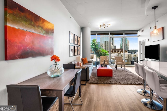 interior space featuring floor to ceiling windows and wood-type flooring