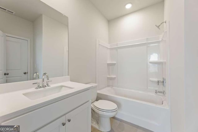 full bathroom with bathing tub / shower combination, vanity, and toilet