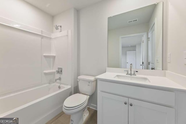 full bathroom with toilet, bathtub / shower combination, and vanity