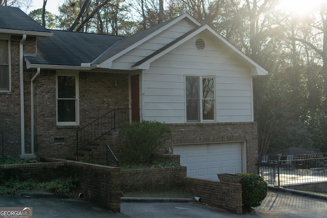 view of front of property featuring a garage