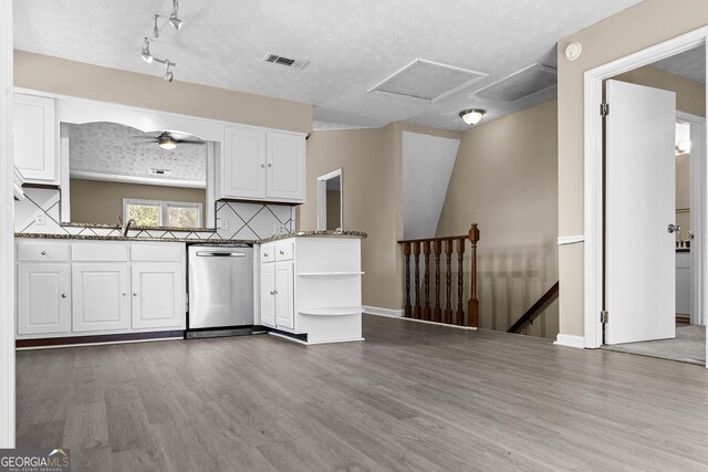 bathroom featuring toilet, vanity, and hardwood / wood-style floors