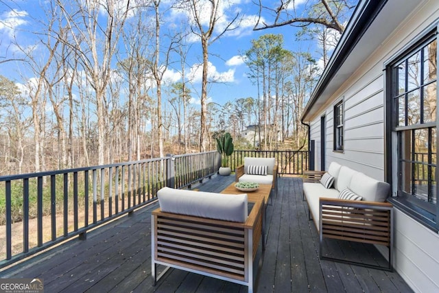 deck featuring an outdoor living space