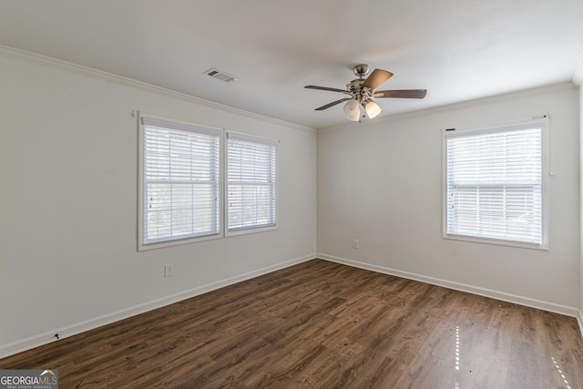 unfurnished room with a healthy amount of sunlight, ceiling fan, and crown molding