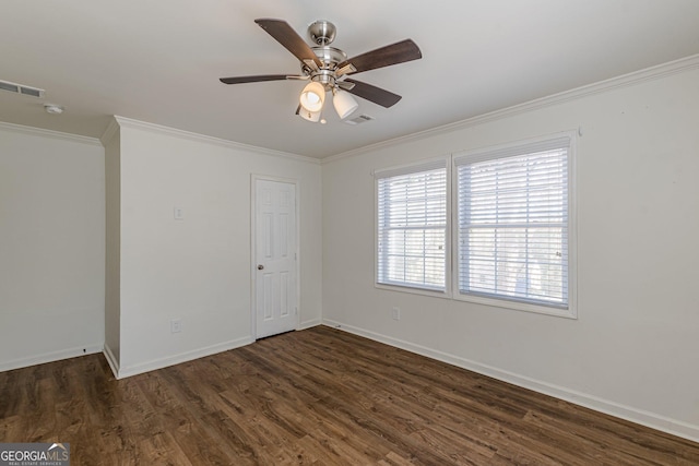 unfurnished room featuring ceiling fan, crown molding, and dark wood-type flooring