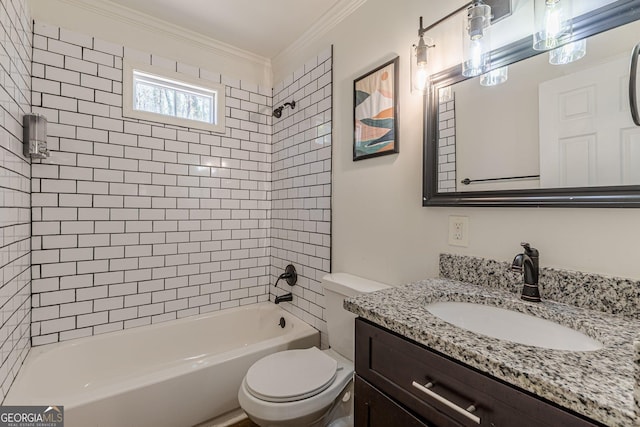 full bathroom with toilet, vanity, ornamental molding, and tiled shower / bath