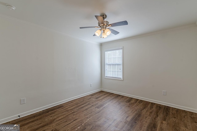 unfurnished room featuring ceiling fan, crown molding, and dark hardwood / wood-style flooring