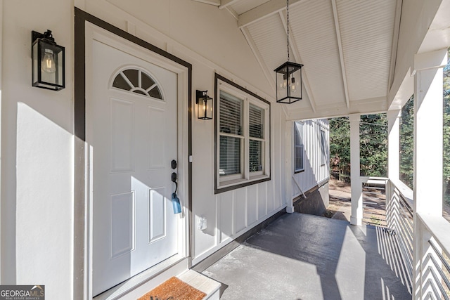 doorway to property with covered porch