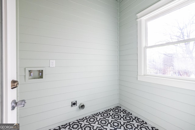 laundry room featuring washer hookup and electric dryer hookup