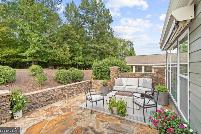 view of patio with an outdoor living space