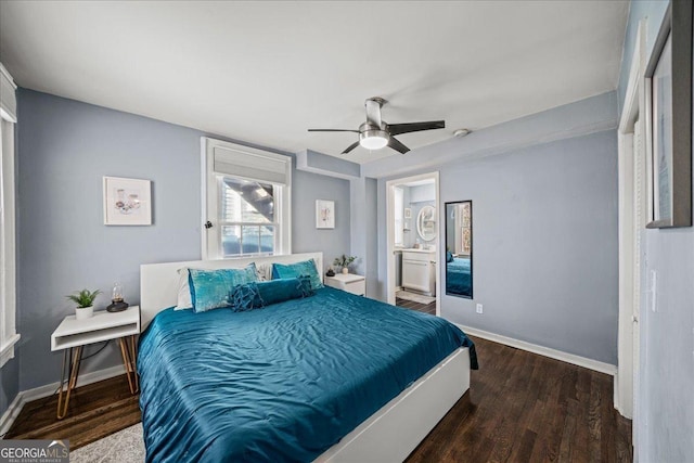 bedroom featuring ceiling fan, dark wood-type flooring, and connected bathroom