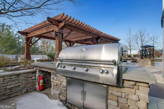 view of patio / terrace featuring a grill and area for grilling