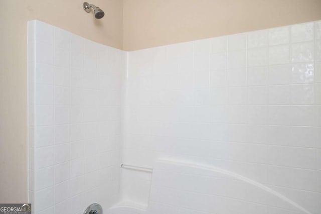 bathroom with shower / bathing tub combination