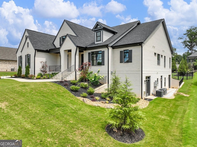 view of front of home with a front lawn