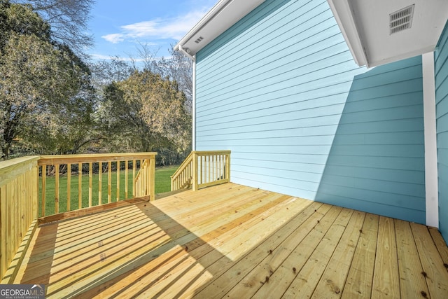 deck with a lawn