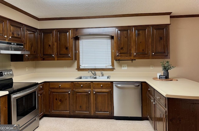 kitchen featuring a textured ceiling, stainless steel appliances, ornamental molding, dark brown cabinets, and sink