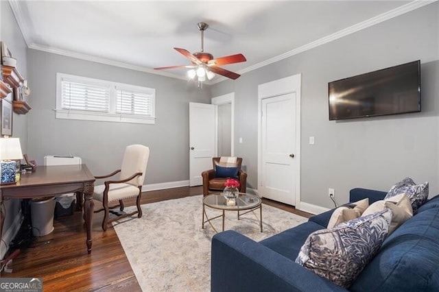 living room featuring ceiling fan, dark hardwood / wood-style flooring, and ornamental molding