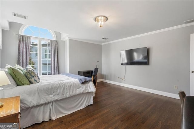 bedroom with dark wood-type flooring and ornamental molding