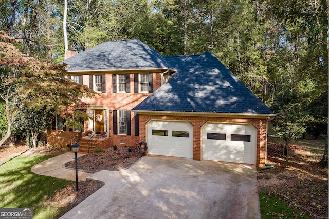 view of front of property with a garage