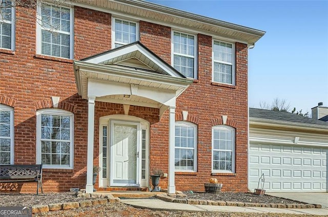 view of front of property featuring a garage