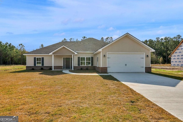 ranch-style house featuring a garage and a front lawn