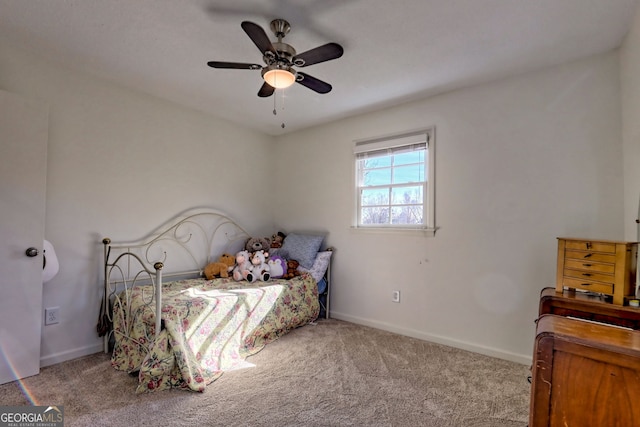 bedroom featuring ceiling fan and light colored carpet