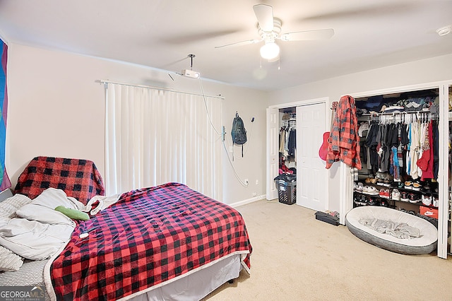 carpeted bedroom with ceiling fan