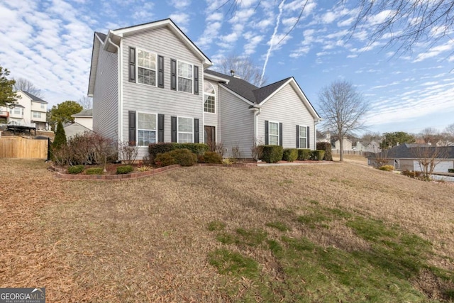 view of property with a front yard