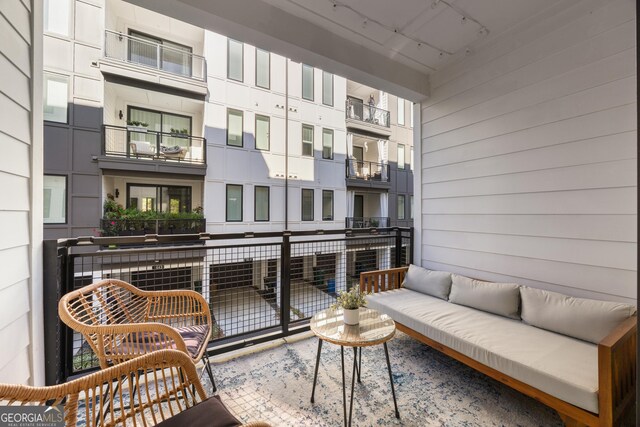 balcony featuring an outdoor hangout area