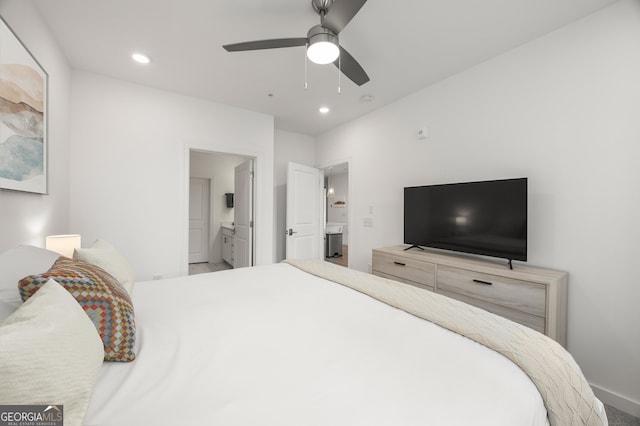 bedroom featuring ensuite bath and ceiling fan