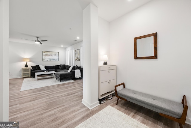 interior space featuring ceiling fan and light hardwood / wood-style flooring