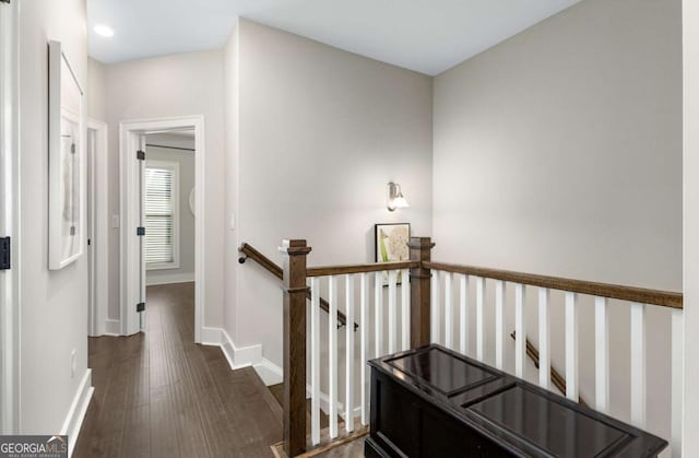 corridor featuring dark hardwood / wood-style floors