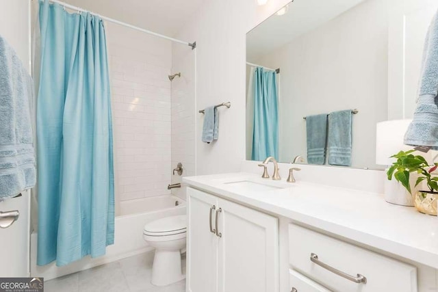 full bathroom with shower / bathtub combination with curtain, vanity, and toilet