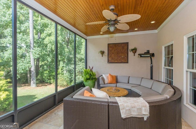 sunroom / solarium with ceiling fan and wood ceiling