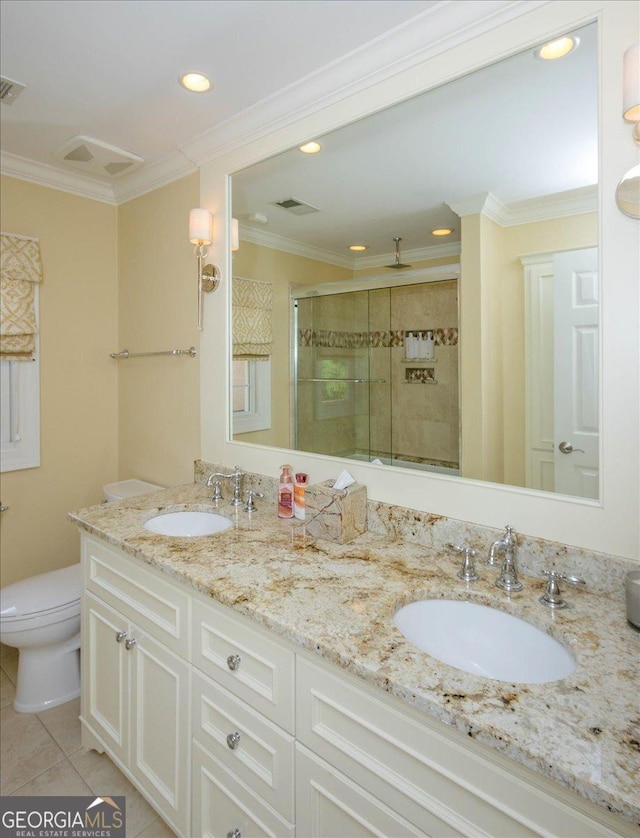 bathroom with toilet, crown molding, tile patterned floors, an enclosed shower, and vanity