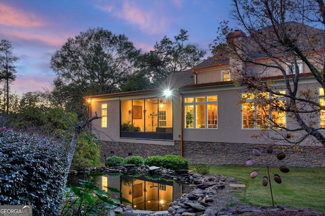 view of property exterior at dusk