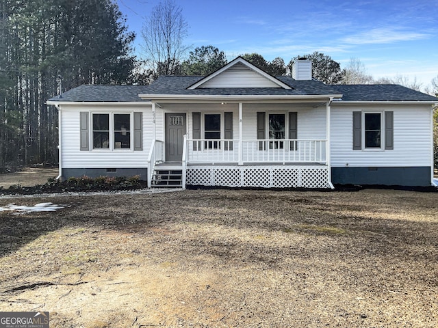 single story home with a front yard and a porch