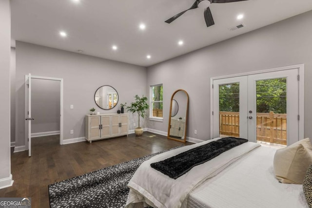 bedroom featuring a towering ceiling, french doors, access to exterior, ceiling fan, and dark hardwood / wood-style flooring