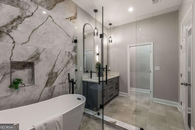 bathroom featuring vanity and a bathing tub