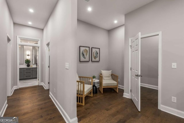 corridor featuring dark hardwood / wood-style floors