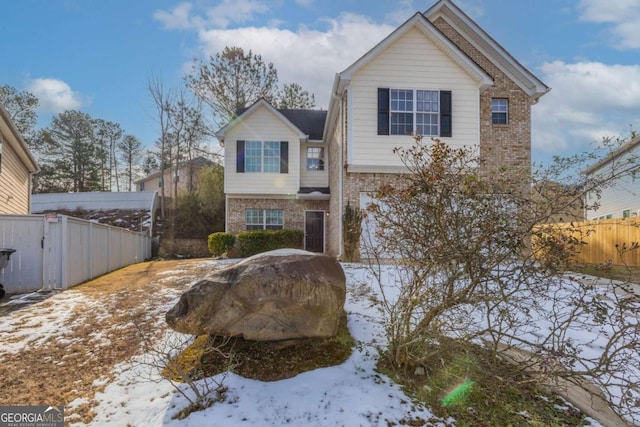 view of snow covered house