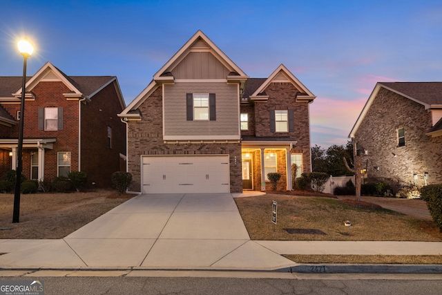 view of front of home with a garage