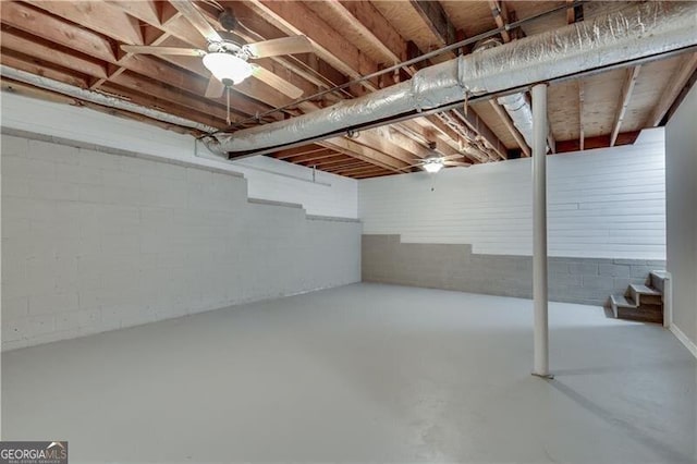 basement featuring ceiling fan