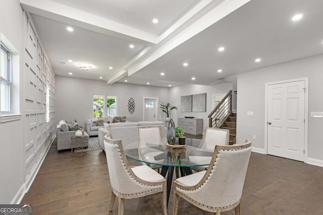 dining space featuring dark hardwood / wood-style flooring