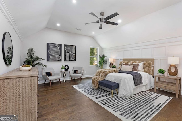 bedroom featuring ceiling fan, crown molding, lofted ceiling, and dark hardwood / wood-style floors