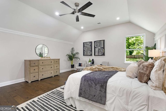 bedroom featuring vaulted ceiling, ceiling fan, and dark hardwood / wood-style flooring