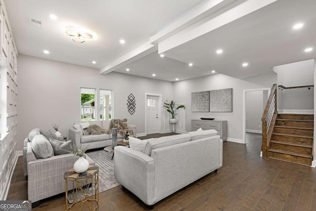 living room with beam ceiling and dark hardwood / wood-style floors