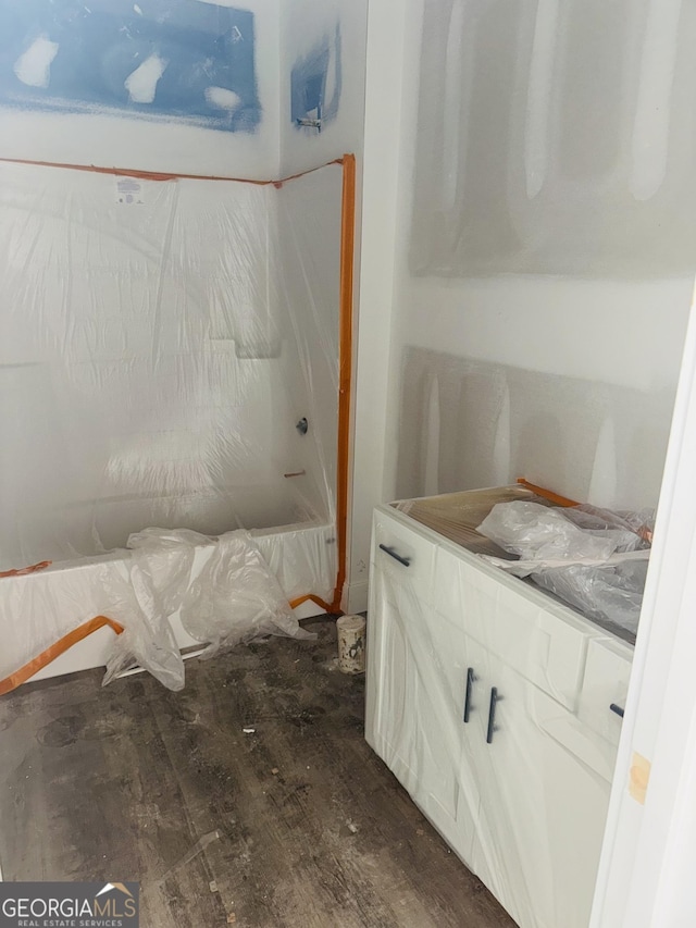 bathroom featuring wood finished floors