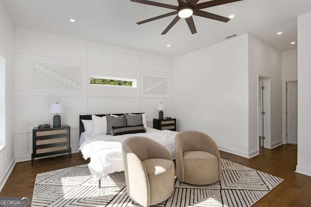 bedroom featuring dark hardwood / wood-style flooring and ceiling fan